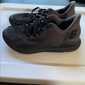 New Balance Black Athletic Shoes Fuelcell Propel women size 8 good condition